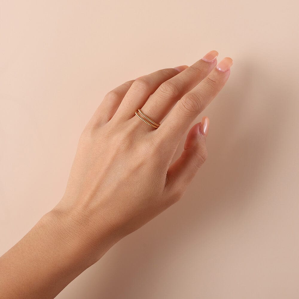 Pair of Gold Plated Braided Rings on model