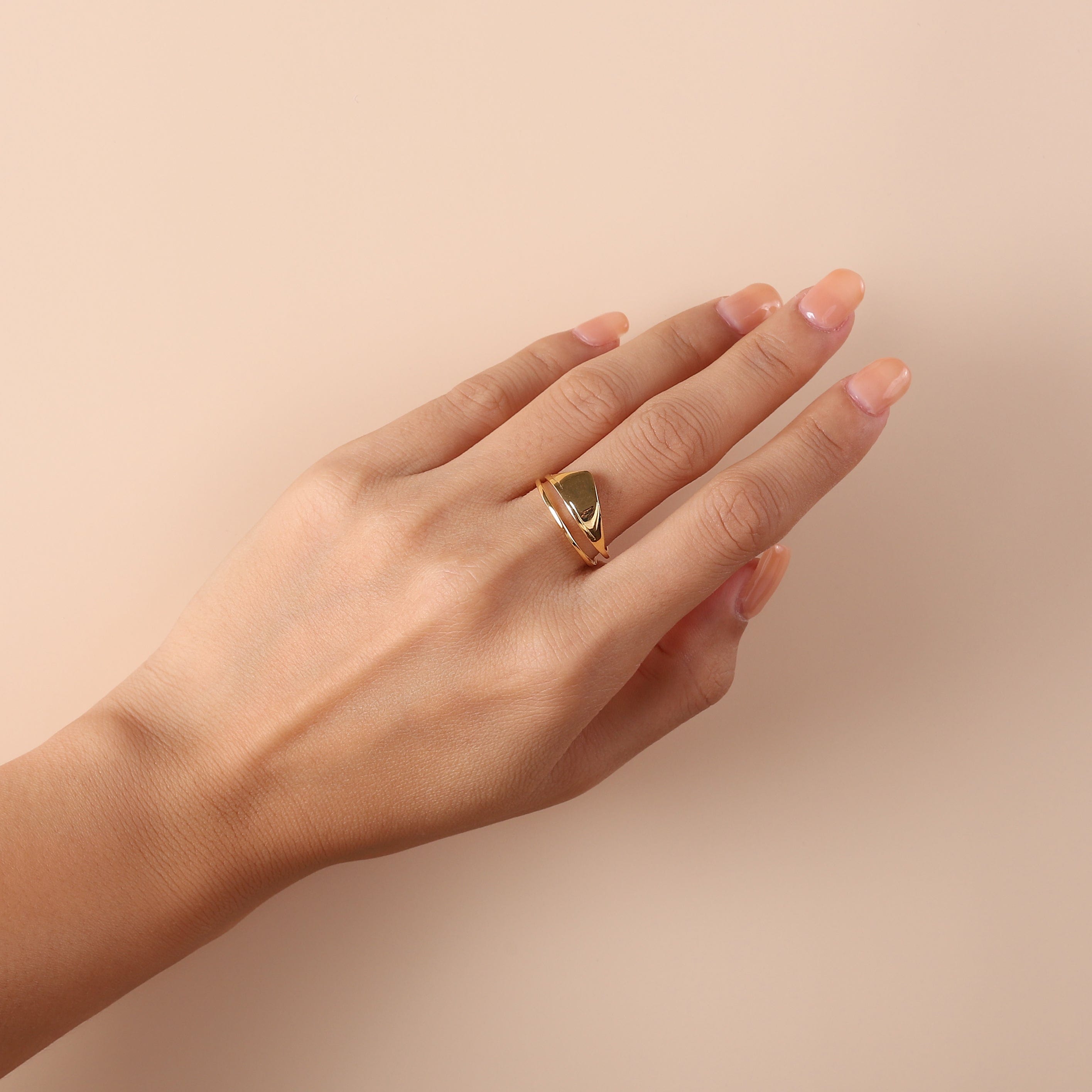 gold plated shark ring on model