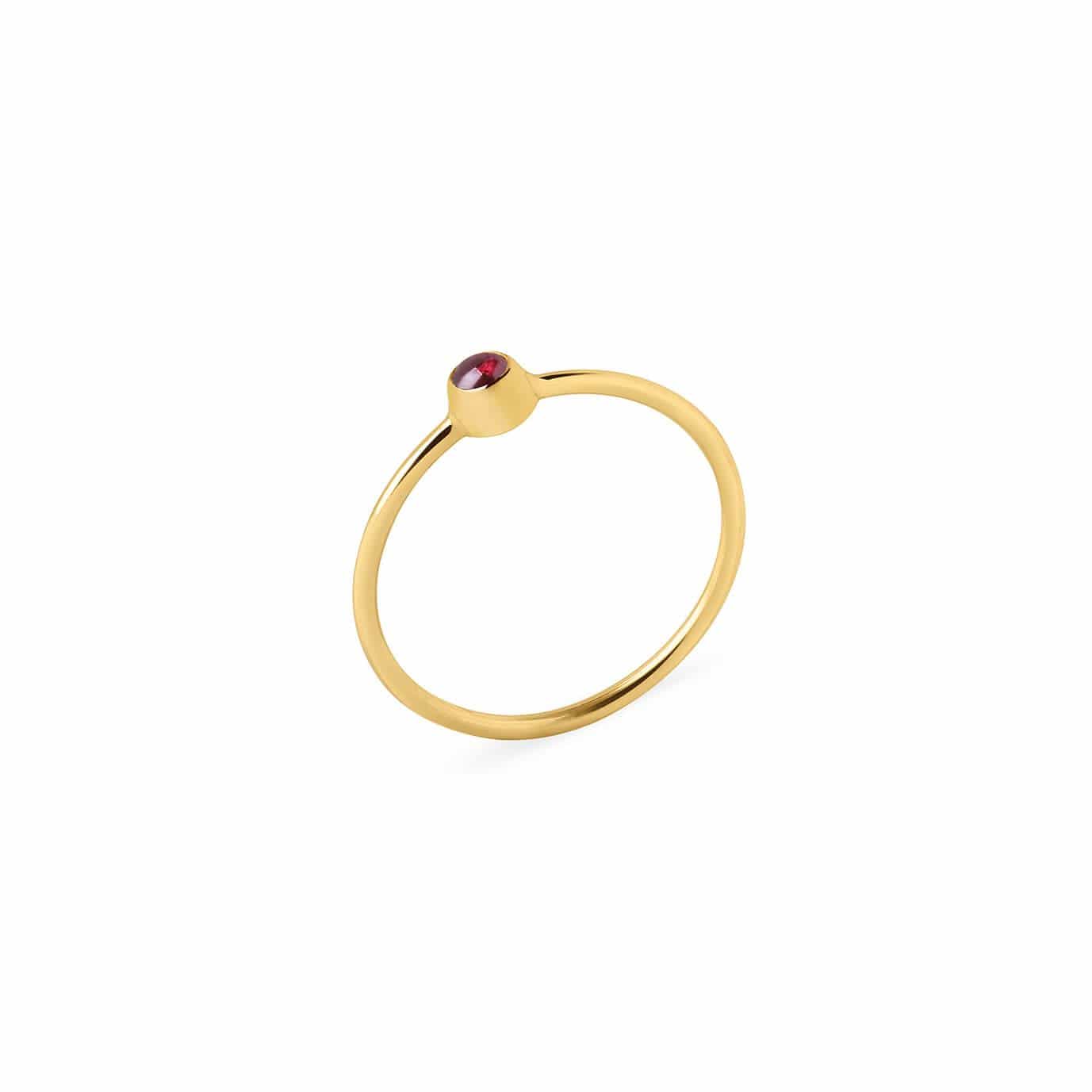 gold plated ring with red garnet