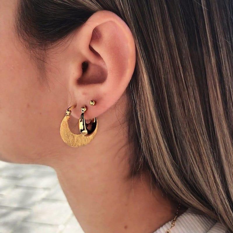 model with Matt Gold Plated Flat Indian Hoop Earrings
