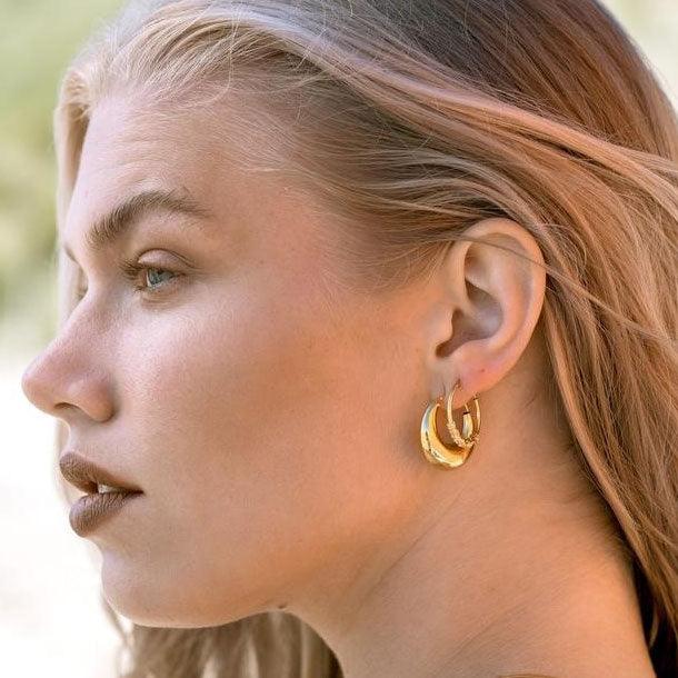 model with Bold Gold Plated Indian Hoop Earrings