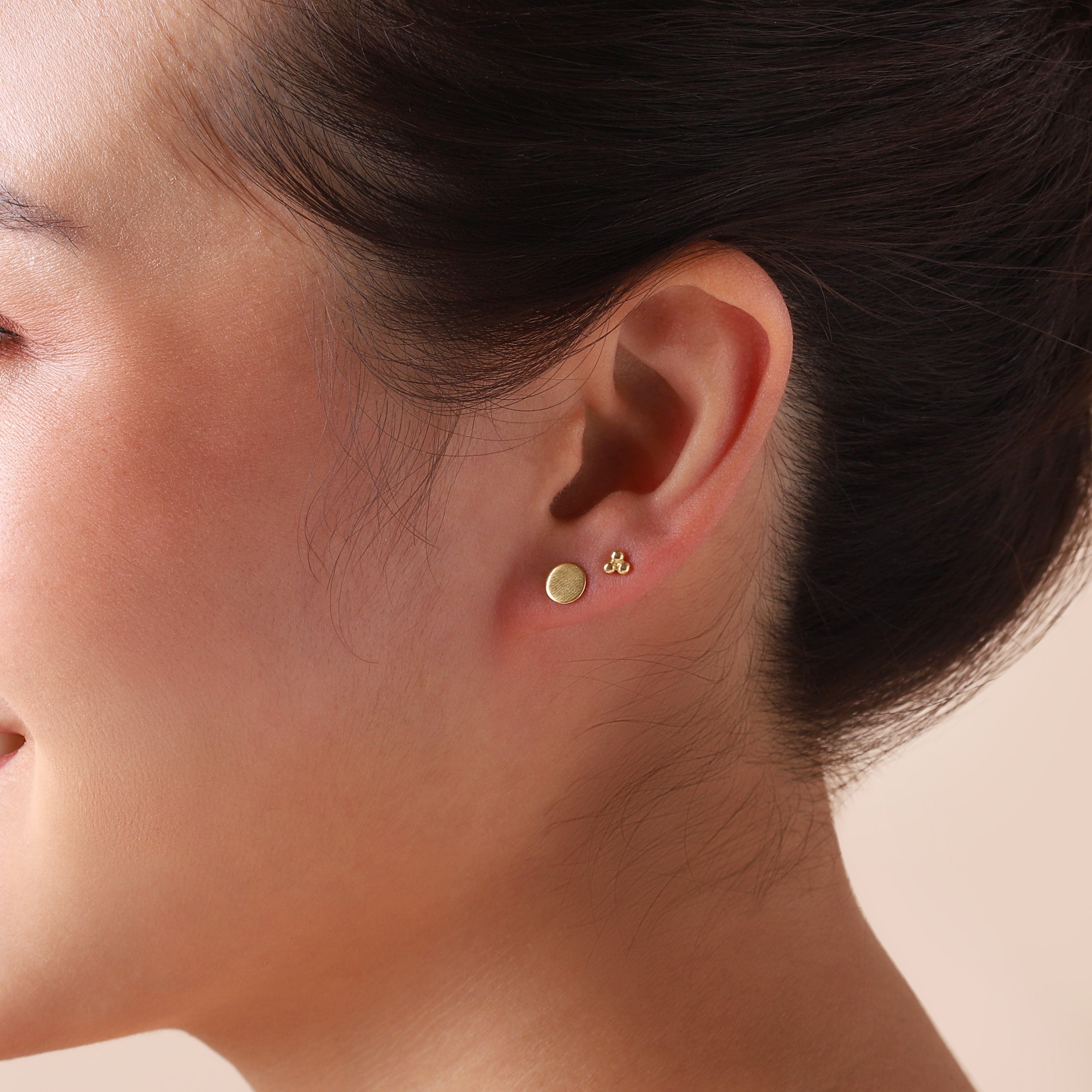 gold plated coin stud earrings 7MM on model