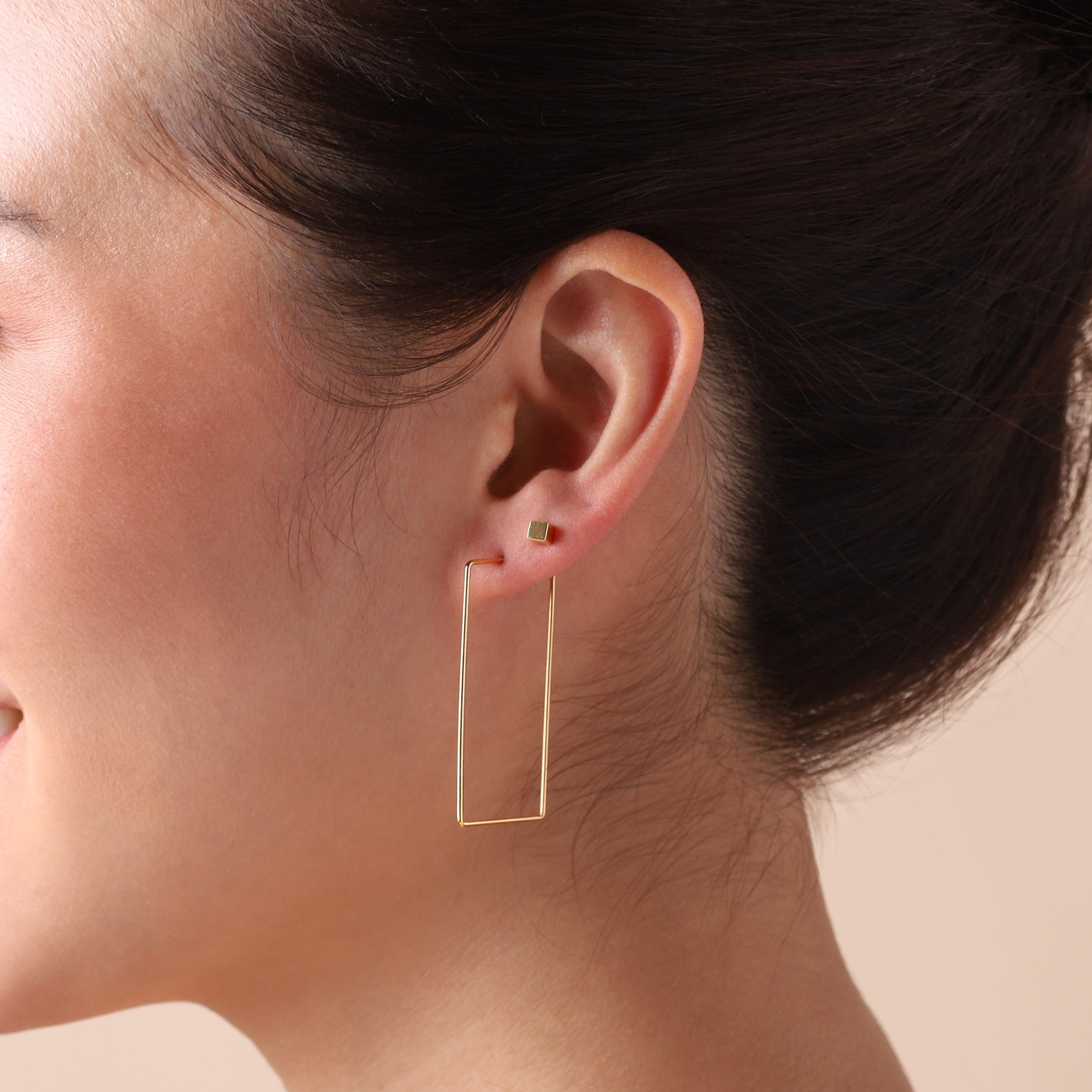 gold plated rectangle hoop earrings on model