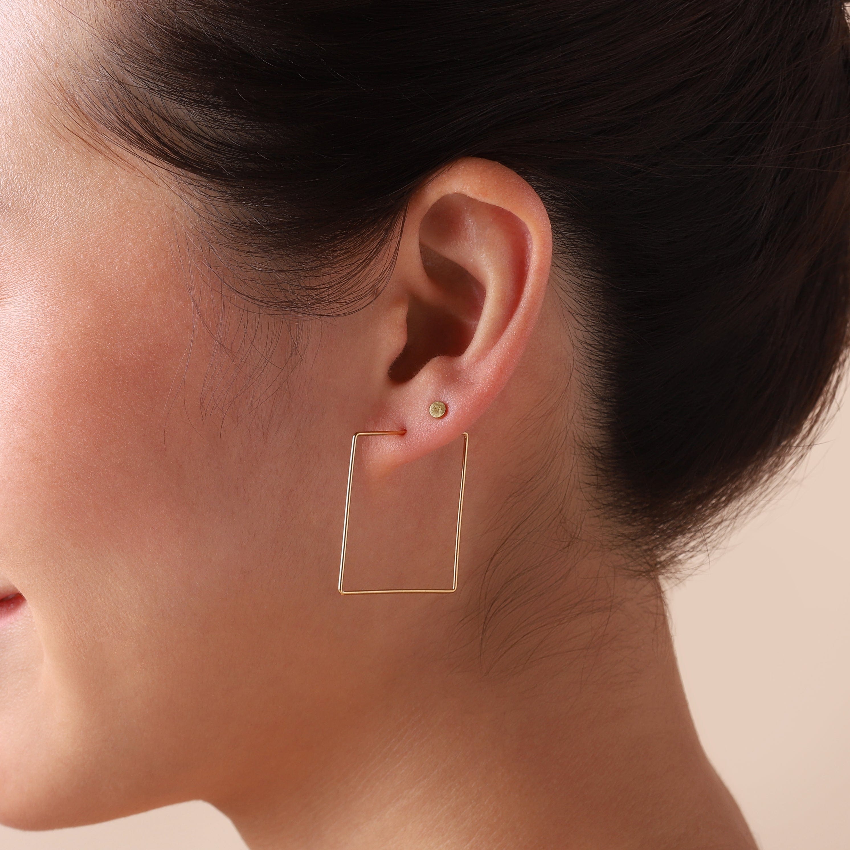 matte gold mini stud earring 3mm on model