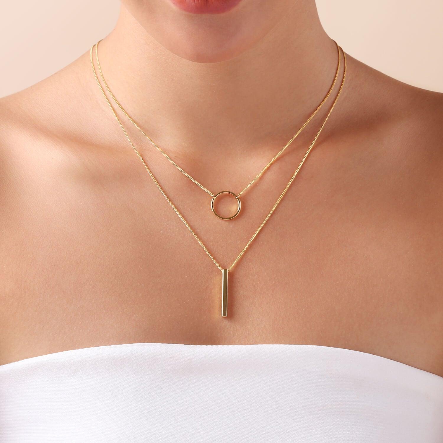 model with Gold Plated Double Necklace with Circle and Rod