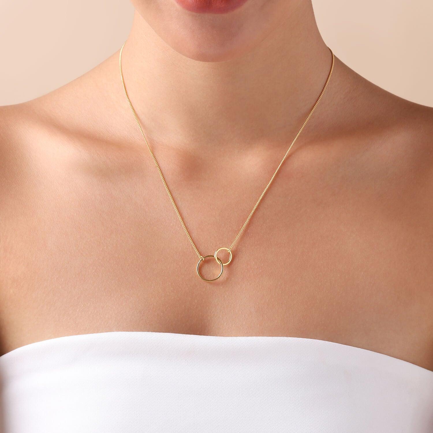 model with Gold Plated Necklace with Double Circle