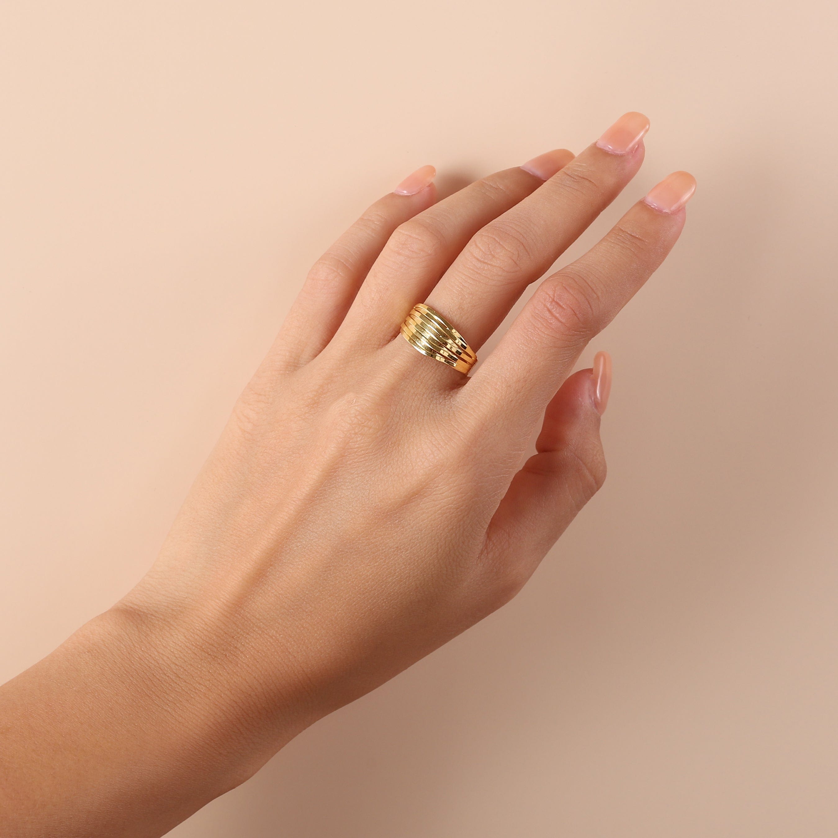 gold plated twisted ring on model
