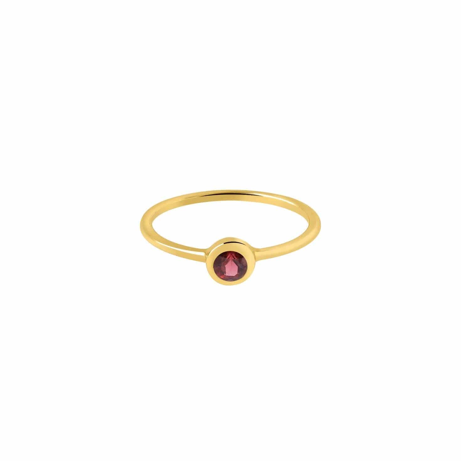 gold plated ring with red garnet