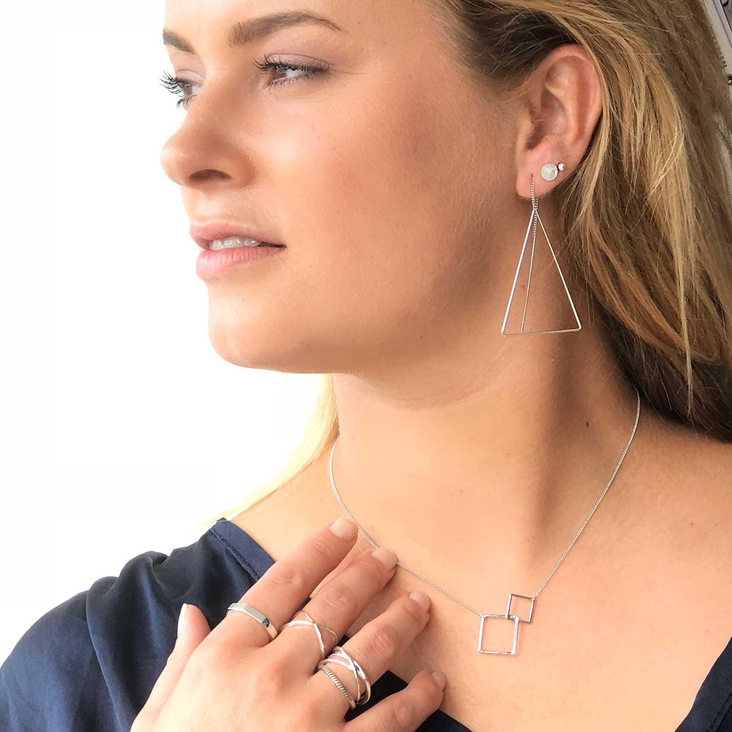 model with silver plated double square necklace