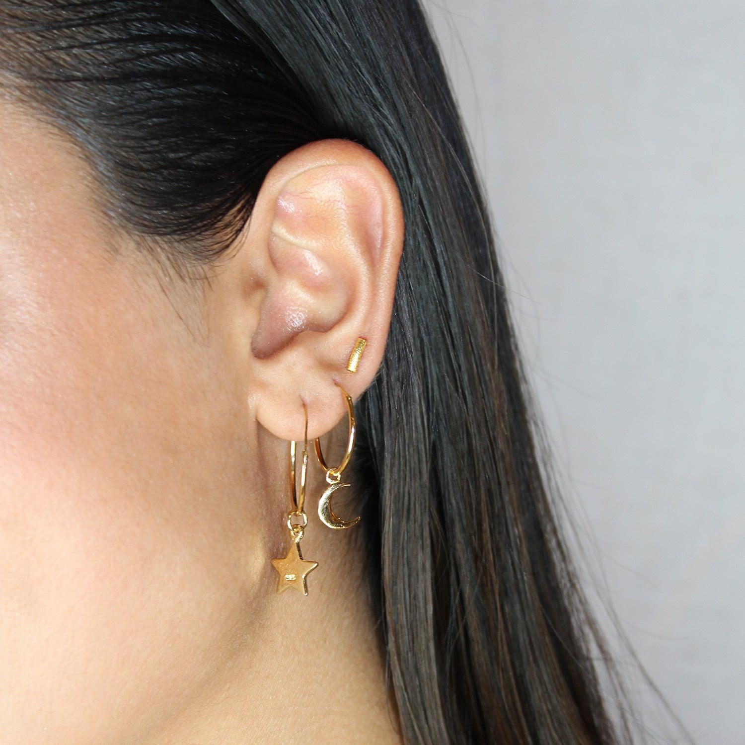 model with 18mm gold plated hoop with moon pendant