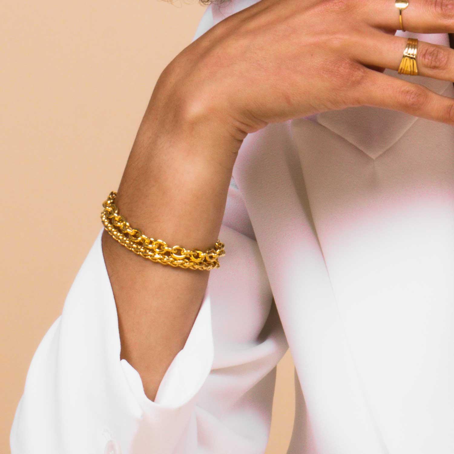model with Rolo chain bracelet gold plated